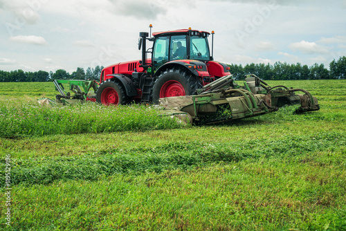 tractor. haying. harvesting grass. farming