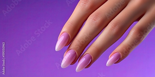 Elegant female hands with glossy summer pink manicure on long almond-shaped nails against a vibrant purple gradient backdrop ideal for copy space. photo