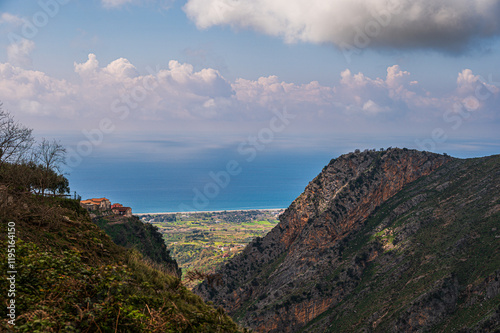 top view of the village of Grisolia with a cloudy sky in the background, Cosenza
