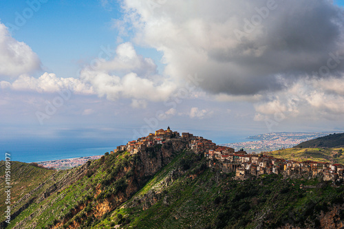 top view of the village of Grisolia with a cloudy sky in the background, Cosenza