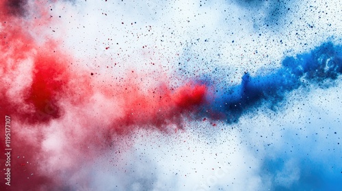 A vibrant explosion of colored powder, with bold red on the left and bright blue on the right,