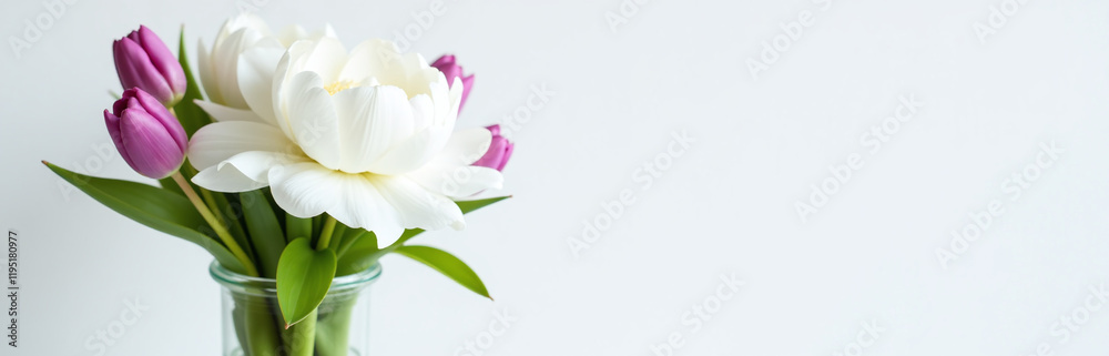 Fototapeta premium A Delicate Bouquet Of White Peonies And Purple Tulips Adorns A Simple Glass Vase On A Crisp White Background. 00002