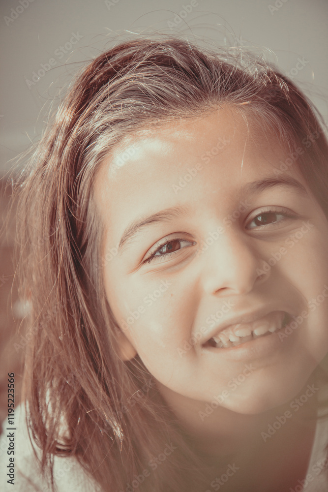 close up of a little girl receiving a gift and being excited close up of a little girl receiving a gift and being excited