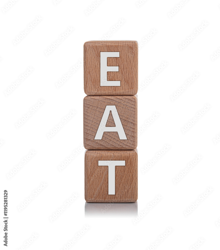 Wooden cubes with the inscription EAT on a white background.