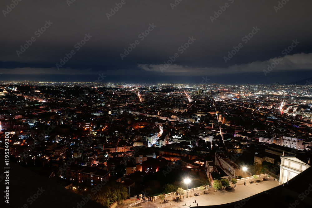 Fototapeta premium Night view of the city of Naples and its historic center, Italy.