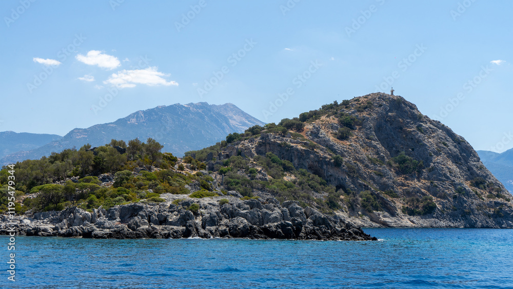 Gemiler Island or Saint Nicholas island located off coast of Turkey near city Fethiye or Oludeniz. Byzantine remains of several Greek churches. Gemile in Mediterranean Sea Gemiler Island or Saint Nicholas island located off coast of Turkey near city Fethiye or Oludeniz. Byzantine remains of several Greek churches. Gemile in Mediterranean Sea