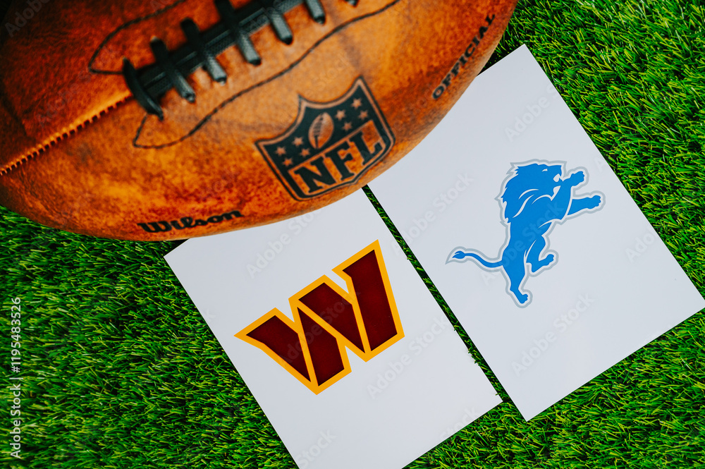 Fototapeta premium Detroit Lions vs. Washington Commanders, NFL Divisional Round. American football game for season 2024 - 2025. Football Ball on Green Grass and logos. NFL File photo.