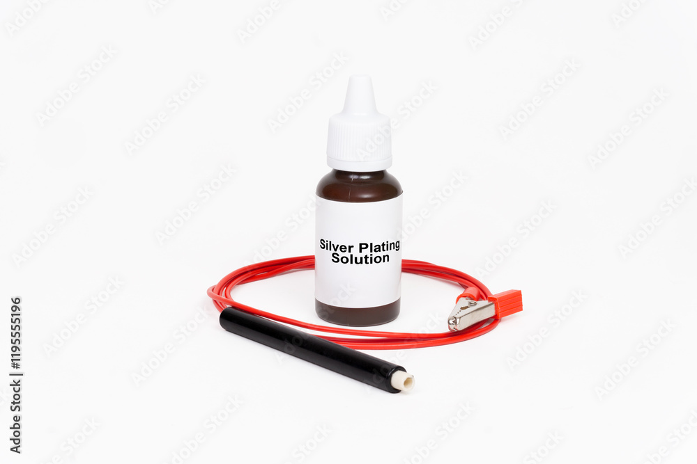 Silver Plating Solution Bottle with Electrode Holder on White Background Silver Plating Solution Bottle with Electrode Holder on White Background