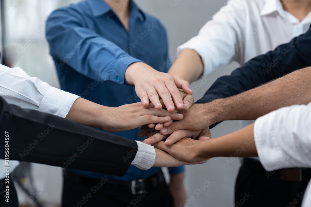 Group of diverse office worker join hand together in office room symbolize business synergy and strong productive teamwork in workplace. Cooperation and unity between business employee. Prudent Group of diverse office worker join hand together in office room symbolize business synergy and strong productive teamwork in workplace. Cooperation and unity between business employee. Prudent