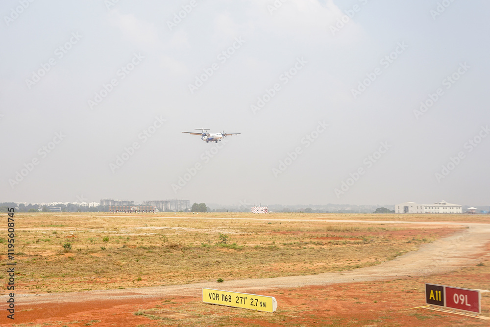 Bangalore Airport, Karnataka, India, a plane flying in the air