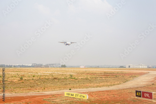 Obraz na płótnie Bangalore Airport, Karnataka, India, a plane flying in the air w salonie
