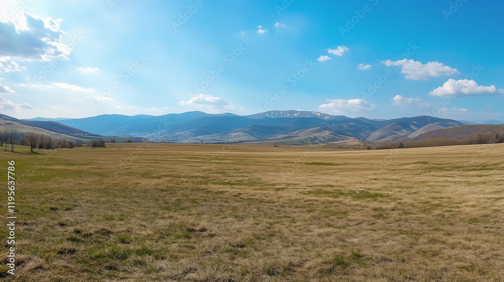 Fototapeta premium Panoramic Countryside with Rolling Green Hills and Bright Sunny Fields in a Tranquil Rural Landscape