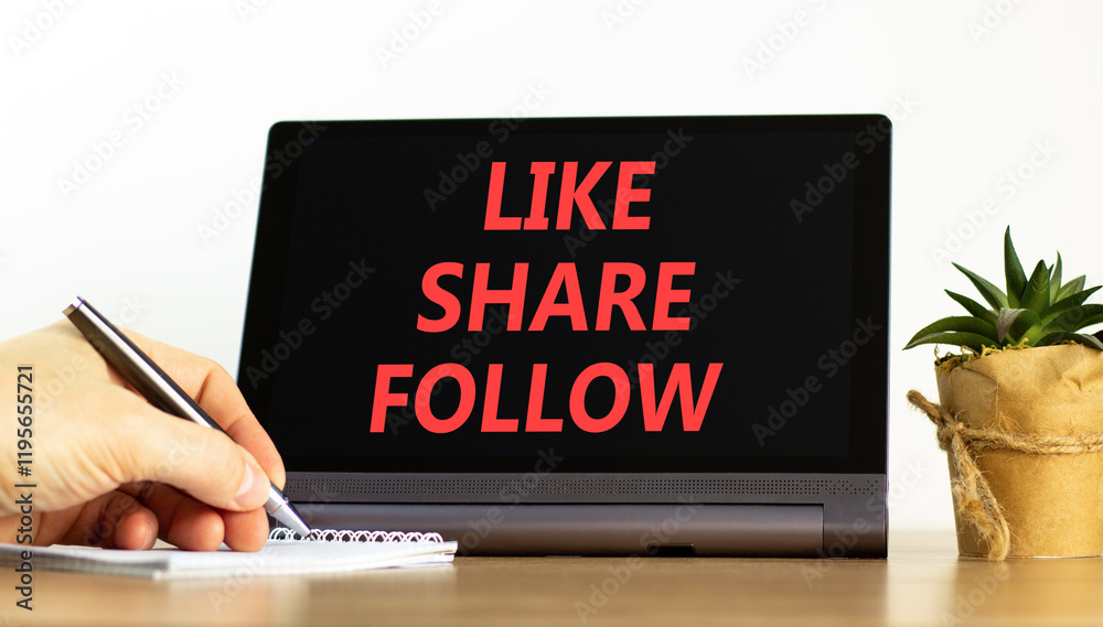 Like share follow symbol. Concept words Like Share Follow on beautiful black tablet. Beautiful white background. Businessman hand. Business like share follow concept. Copy space. Like share follow symbol. Concept words Like Share Follow on beautiful black tablet. Beautiful white background. Businessman hand. Business like share follow concept. Copy space.