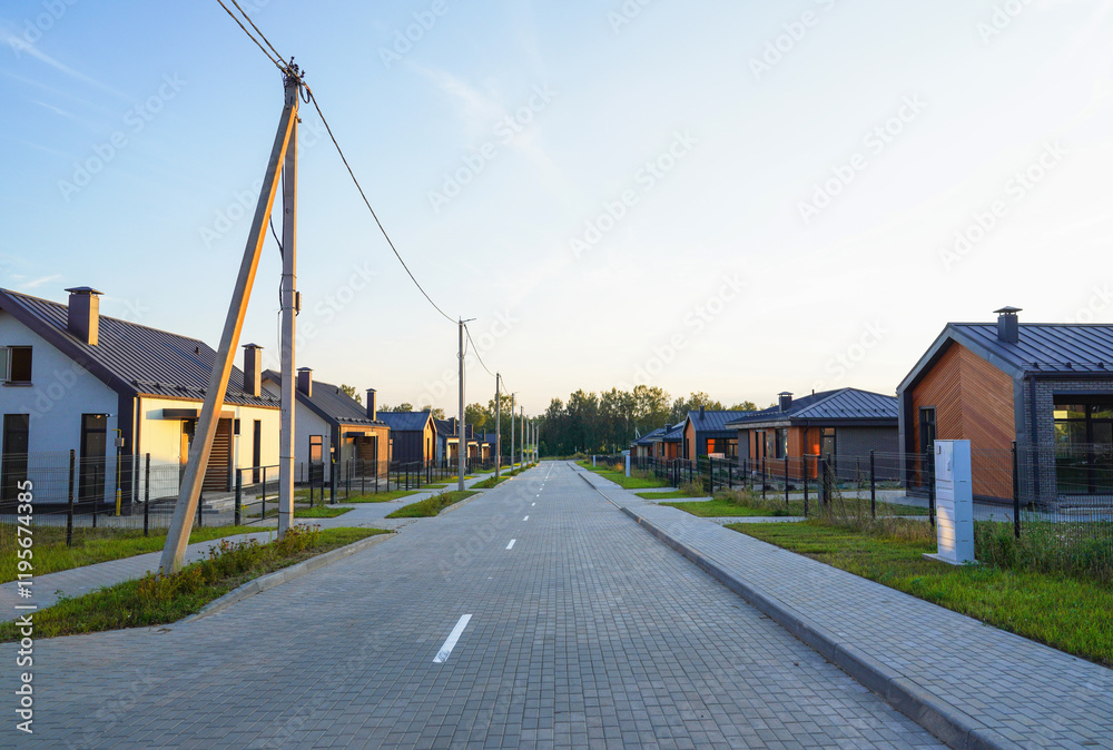 Street road in gated community. Suburban Scandi home in rural. Modern Scandinavian houses in Village. House in suburban neighborhood. Family Home in countryside. Home in countryside. Farmhouse. Street road in gated community. Suburban Scandi home in rural. Modern Scandinavian houses in Village. House in suburban neighborhood. Family Home in countryside. Home in countryside. Farmhouse.