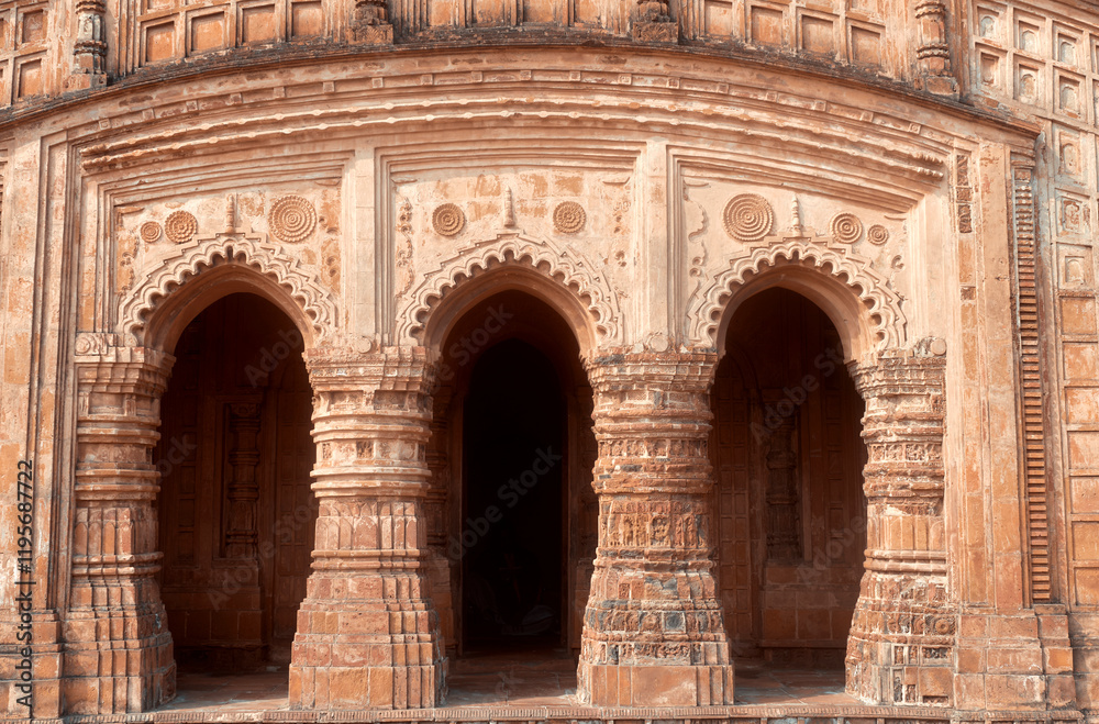 Fototapeta premium religious carvings on wall of Garh Panchakot Pancharatna temple, also known as Ras Mandir, 16th century Hindu terracotta temple built by Singh Deo dynasty of Panchkot. Now a popular travel destination