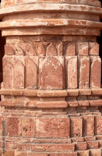 religious carvings on wall of Garh Panchakot Pancharatna temple, also known as Ras Mandir, 16th century Hindu terracotta temple built by Singh Deo dynasty of Panchkot. Now a popular travel destination photo
