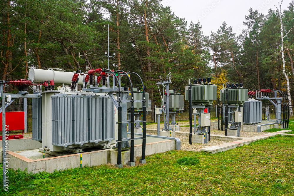 Electrical equipment in outdoor power substation, two three phase oil immersed transformers Electrical equipment in outdoor power substation, two three phase oil immersed transformers