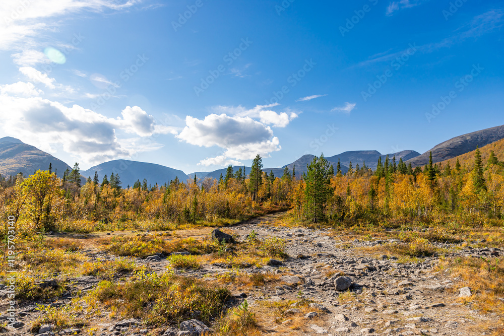 Scenic view of Khibiny mountains. Autumn colored landscape of arctic tundra Murmans region. Kola Peninsula, Russia.