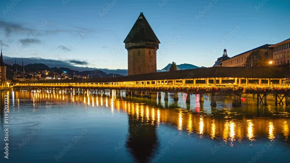 Night to day time lapse panorama Lucerne old town and Chapel bridge (Kapellbrucke), Switzerland.