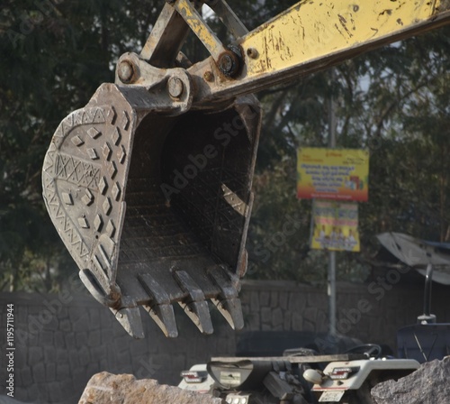 HUGE JCB MACHINE AT WORK AT CONSTRUCTION SITE - REAL ESTATE WORK photo