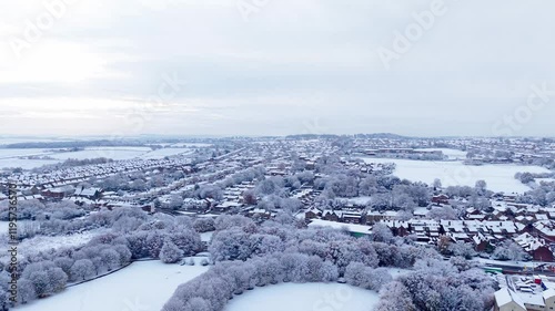 Snow-covered landscape reveals serene rural beauty in winter wonderland