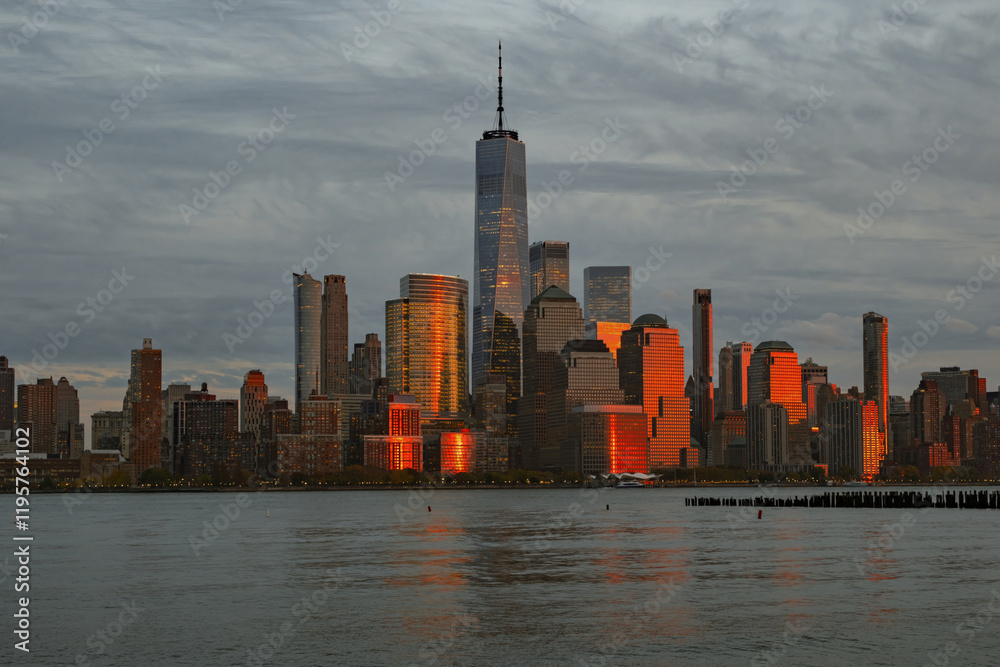 Fototapeta premium Manhattan skyline with WTC. Financial District NYC. Twin Towers memorial. World Trade Center over Hudson river.