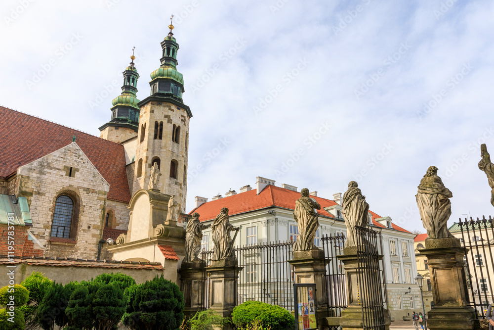 Obraz premium Poland, Krakow. Spires of St Andrews Church in distance.