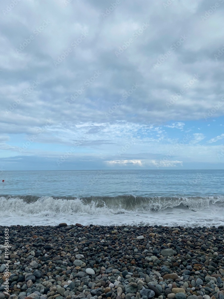 Pebble Beach with Ocean Waves under a Cloudy Sky, sea, ocean, coast Pebble Beach with Ocean Waves under a Cloudy Sky, sea, ocean, coast