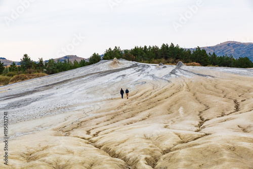 Romania, Buzau County, Berca. Botanical reservation Vulcanii Noroiosi de la Paclele Mici. Small volcano-shaped structures caused by eruption of natural gases. photo