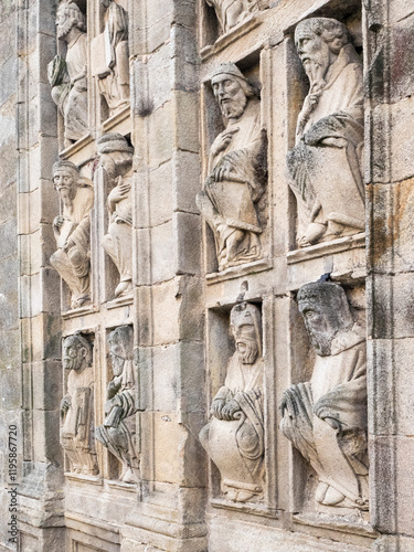Sculptors or carvings of the 'doormen' on the Puerta Santa doorway of the Santiago Cathedral. photo