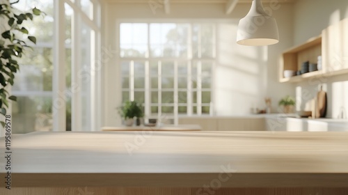 A wooden tabletop in focus with a blurred, sunlit kitchen in the background featuring large windows and modern decor.