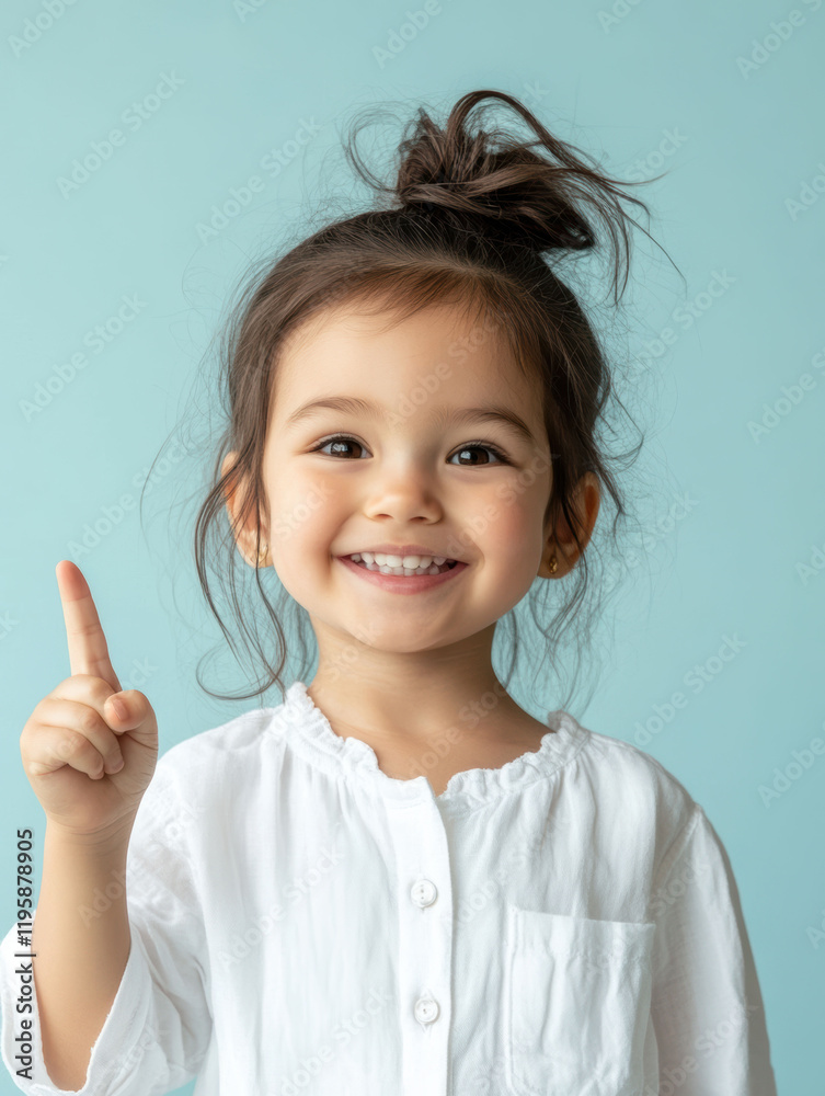 A joyful child with a whimsical hairstyle and a bright smile gestures with curiosity and innocence, radiating happiness and charm. A joyful child with a whimsical hairstyle and a bright smile gestures with curiosity and innocence, radiating happiness and charm.