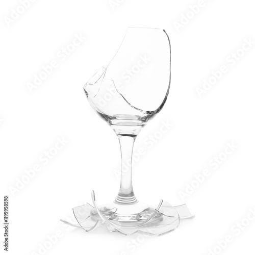 Pieces of broken wine glass isolated on white photo