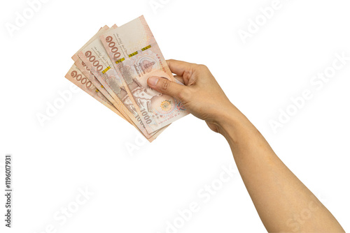 Foto Asian woman holding Thai baht banknote money in hand isolated on white background