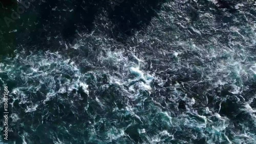 Aerial View of Turbulent Ocean Waves in Motion