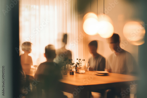 Silhouettes of Diverse Young Adults Dining Together in Soft Focus Ambiance