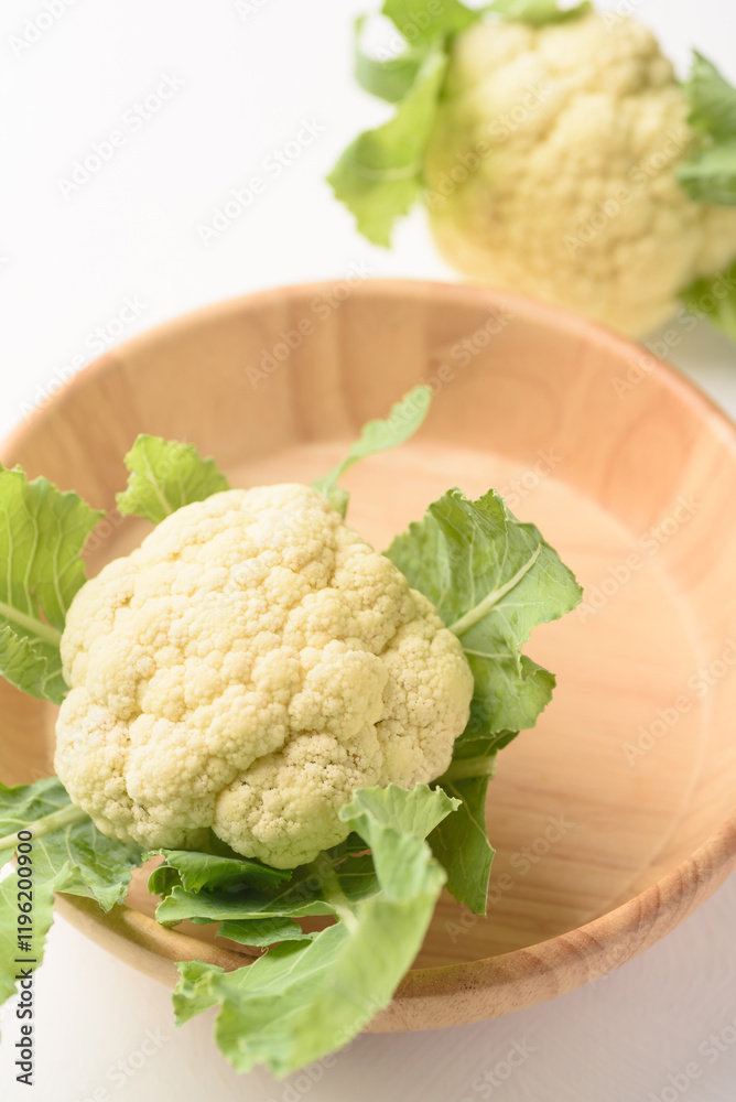 Fresh cauliflower on white background. Local organic farm produce for healthy food ingredients. Fresh cauliflower on white background. Local organic farm produce for healthy food ingredients.