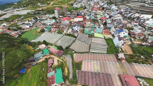 Drone Footage of a Buddhist Temple and Its Surroundings in a Rural Vietnamese Village photo