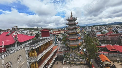 Drone Footage of a Buddhist Temple and Its Surroundings in a Rural Vietnamese Village photo