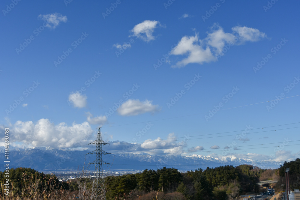 Obraz premium 信州冬の風景 雪が積もった北アルプス