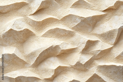 Close-up view of an abstract beige surface with a textured, sculpted appearance resembling sand dunes or mountains.  The image showcases intricate details and a natural, organic aesthetic.