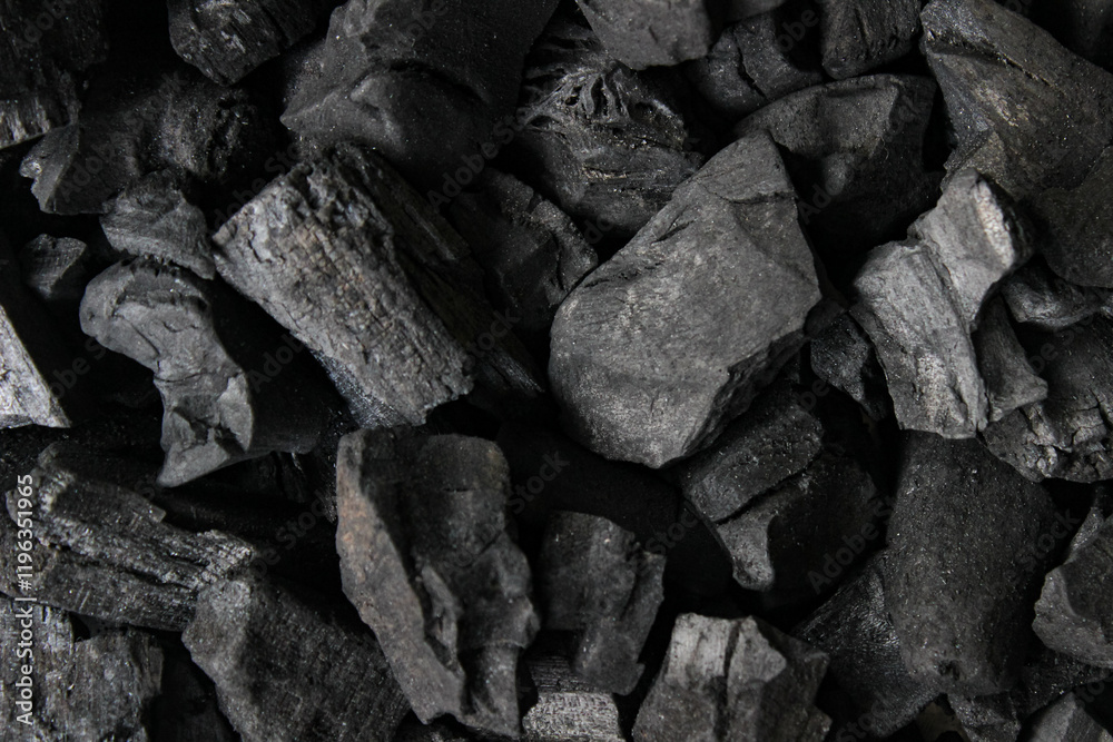 Full view of Charcoal preparation for barbeque. Charcoal texture background Full view of Charcoal preparation for barbeque. Charcoal texture background