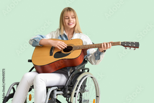 Young woman in wheelchair p...