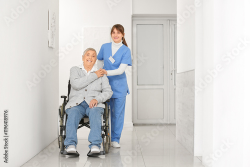 Smiling senior woman in whe...