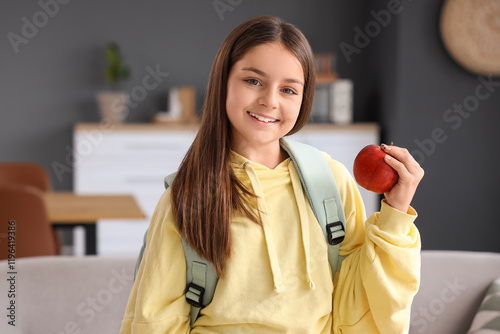 Little schoolgirl with appl...