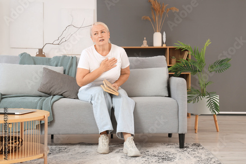 Mature woman having heart a...