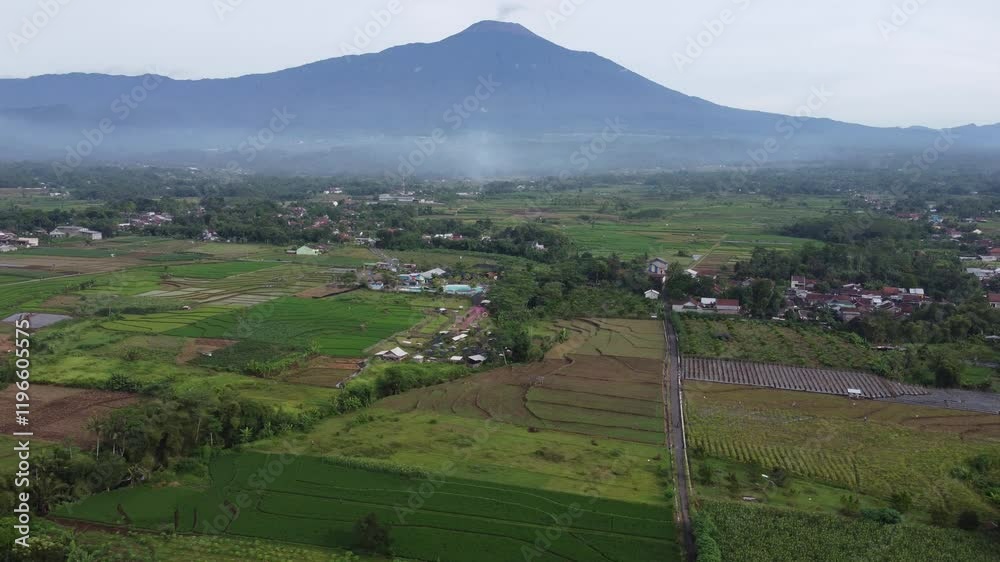The drone view of Slamet Mountain in Banyumas Regency, Central Java, Indonesia. It was taken on January 15, 2025 by a professional. It's a wonderful landscape with a nice view The drone view of Slamet Mountain in Banyumas Regency, Central Java, Indonesia. It was taken on January 15, 2025 by a professional. It's a wonderful landscape with a nice view