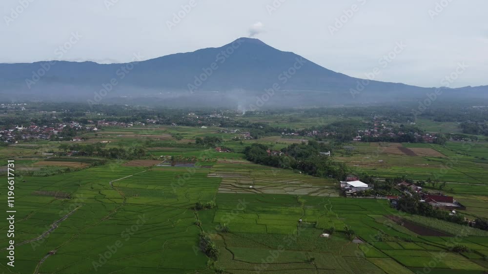 The drone view of Slamet Mountain in Banyumas Regency, Central Java, Indonesia. It was taken on January 15, 2025 by a professional. It's a wonderful landscape with a nice view The drone view of Slamet Mountain in Banyumas Regency, Central Java, Indonesia. It was taken on January 15, 2025 by a professional. It's a wonderful landscape with a nice view