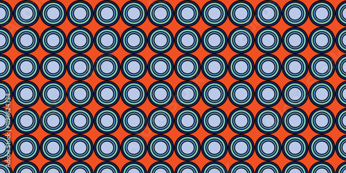 Seamless pattern of concentric circles with light blue centers on an orange background, creating a bold and retro geometric design  Perfect for wallpapers, packaging, and stationery