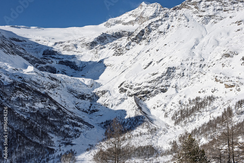 Alp Grüm in winter with snow, Bernina train route